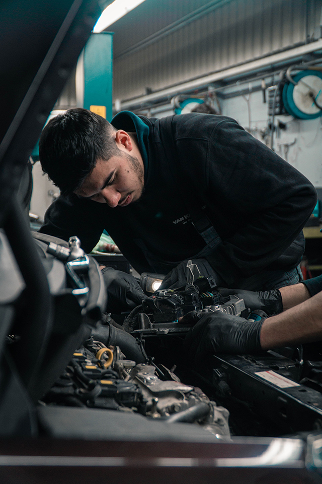 mechanic fixing a campervan - SCC Conversions